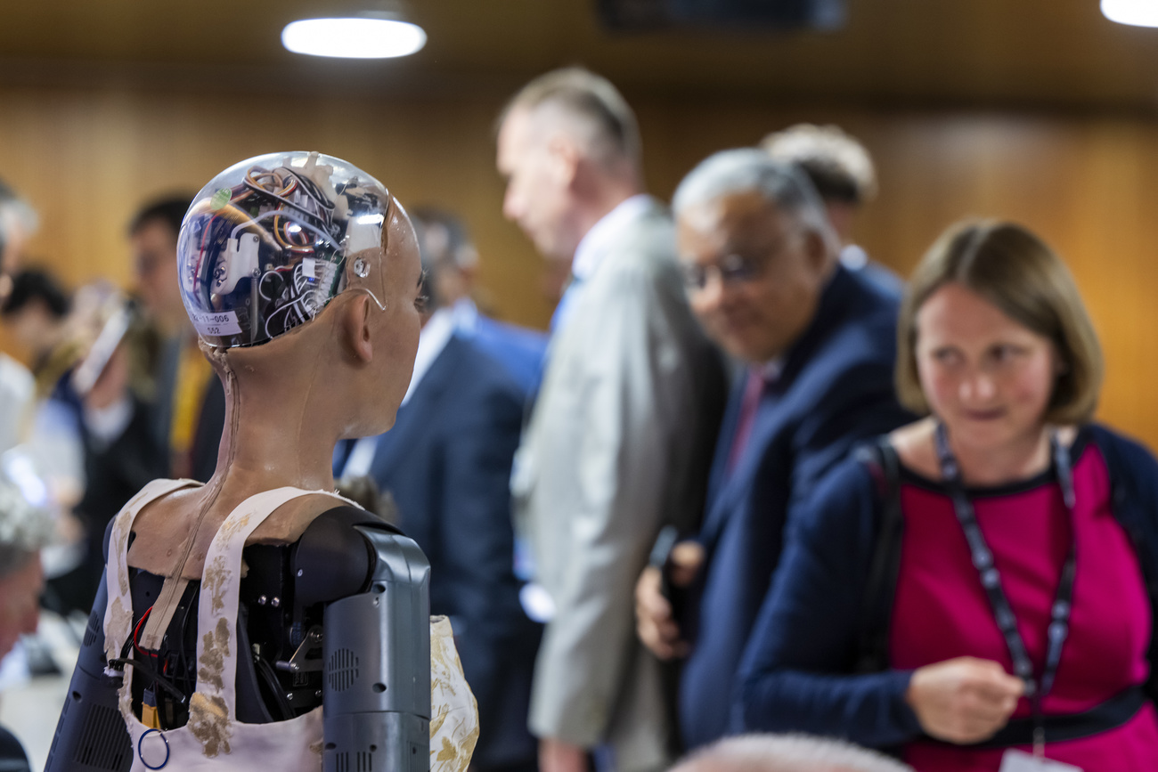 Picture of robot at a AI summit in Geneva with people looking at it