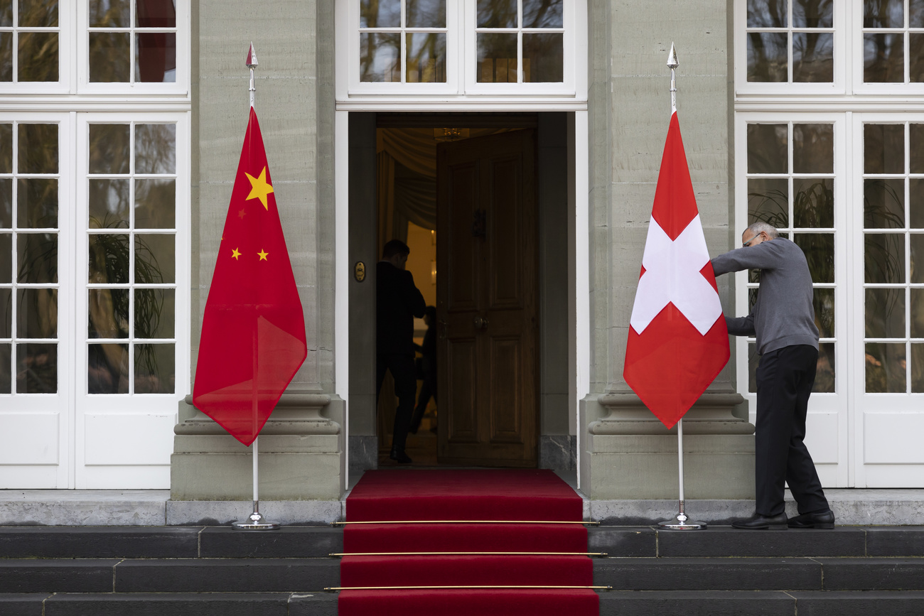 chinese and swiss flags