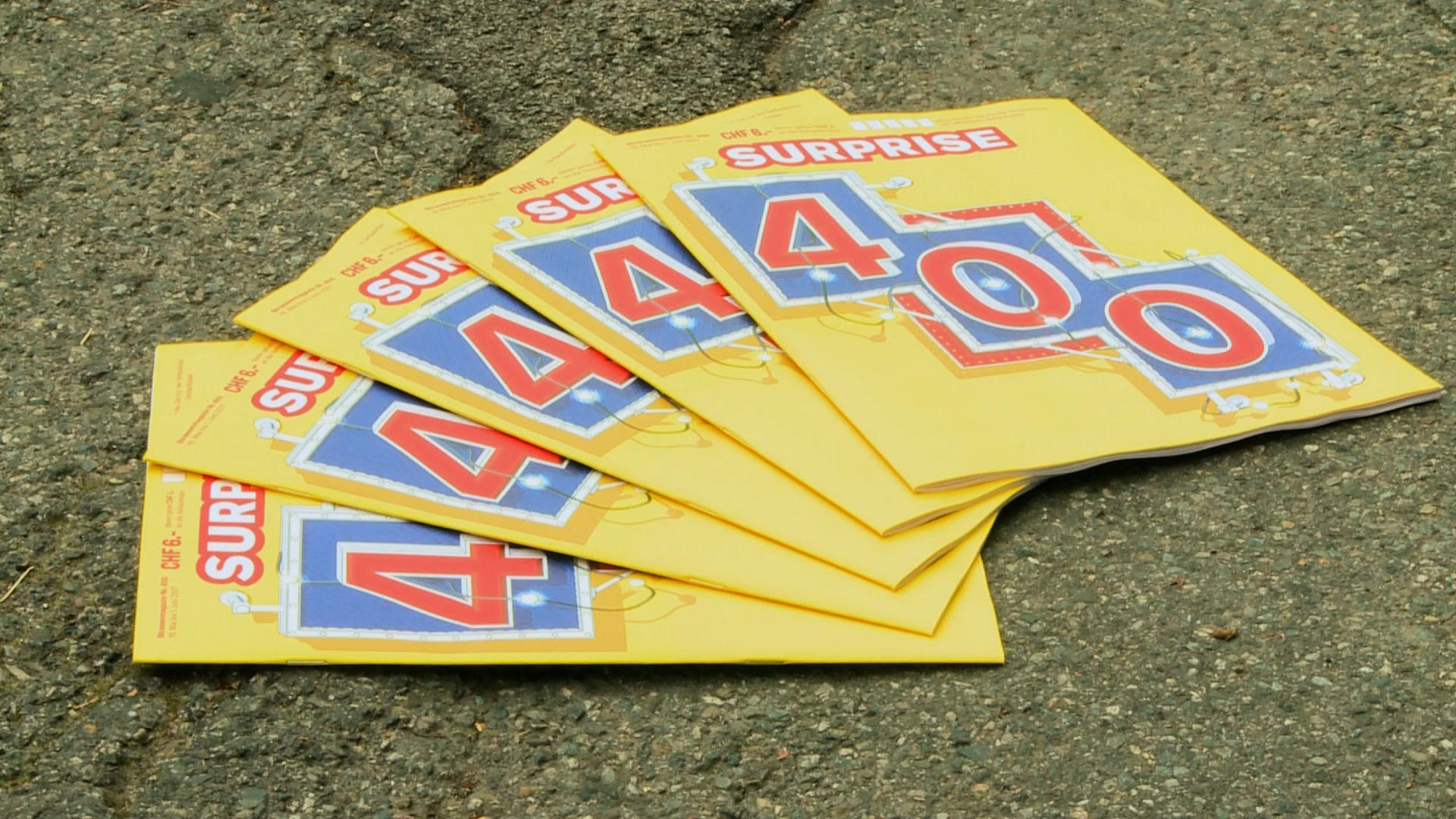 Surpise magazines spread out on floor