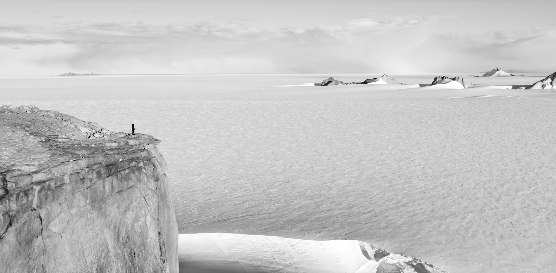Wide image of Antarctica with a tiny human scale