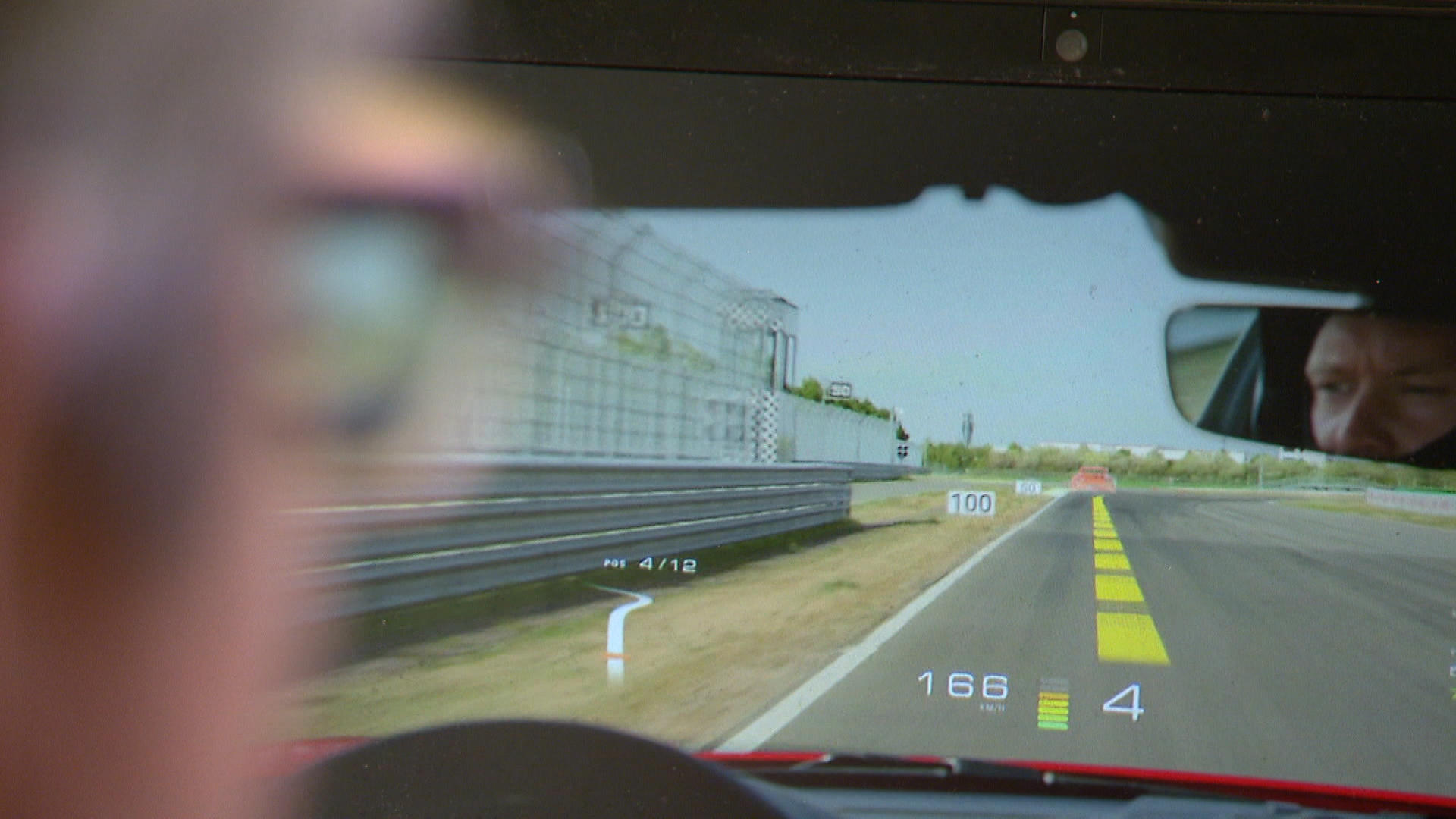 man driving using holograph system