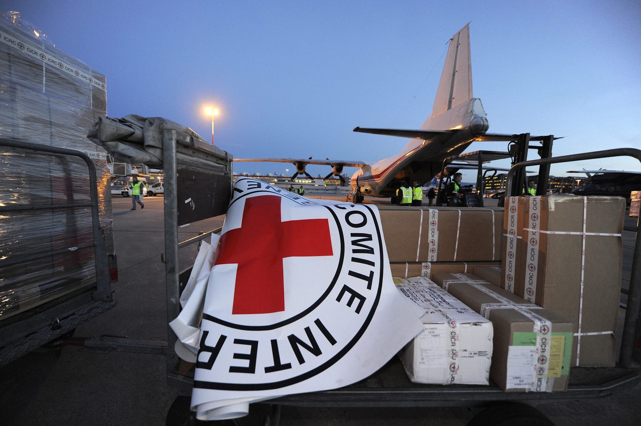 picture of airport and ICRC flag