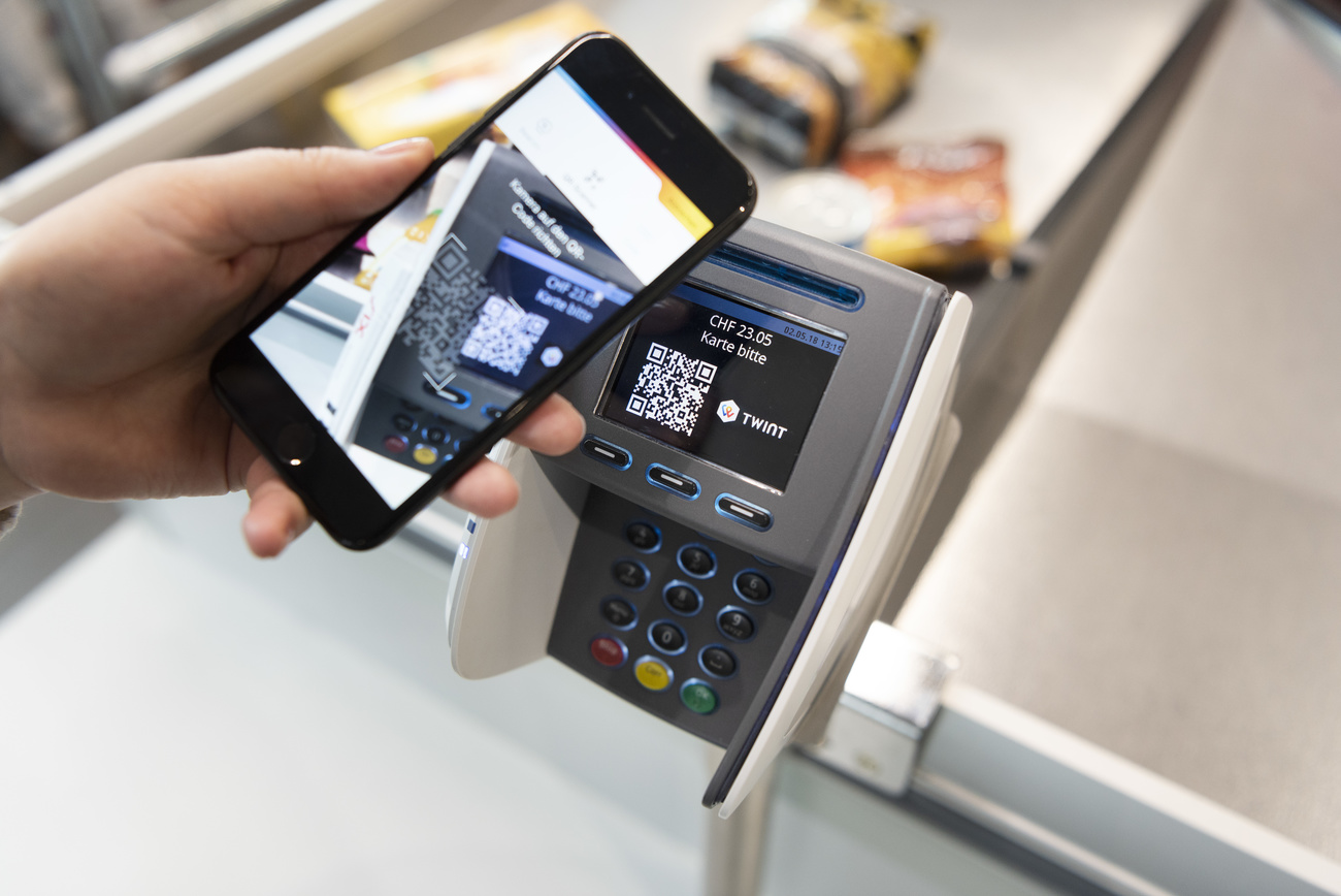 Celular e uma máquina de pagamento