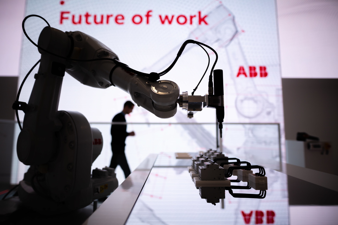 Swiss-Swedish group ABB s robot at trade fair in Germany.