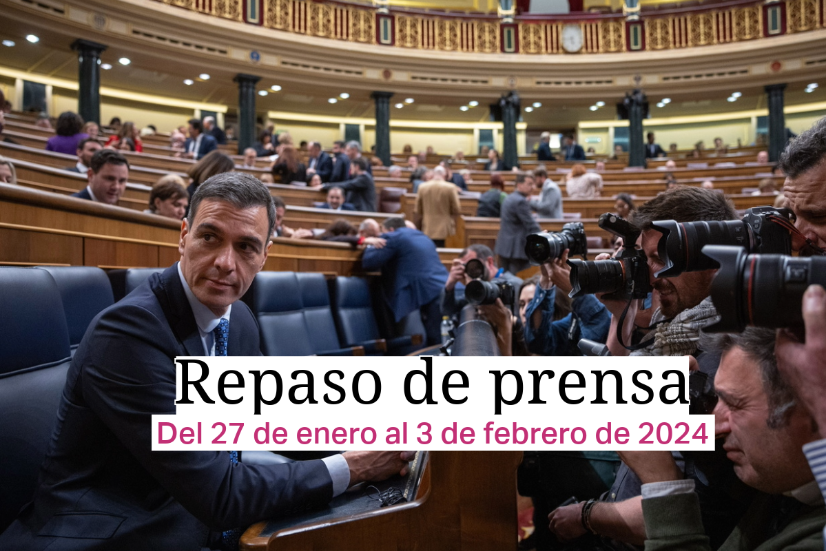 Pedro Sánchez en el Congreso sentado mientra muchísimos cámaras le hacen fotos