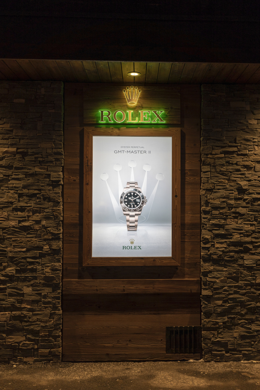 A Rolex shop window in Zermatt, Canton of Valais, Switzerland, pictured at night,