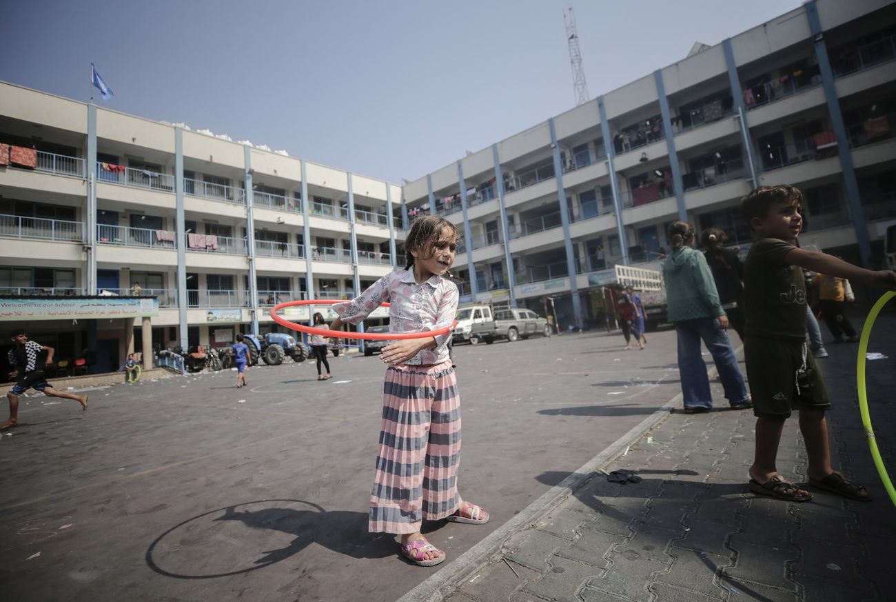 Girl playing in the courtyard of an UNRWA-run school in the Gaza Strip