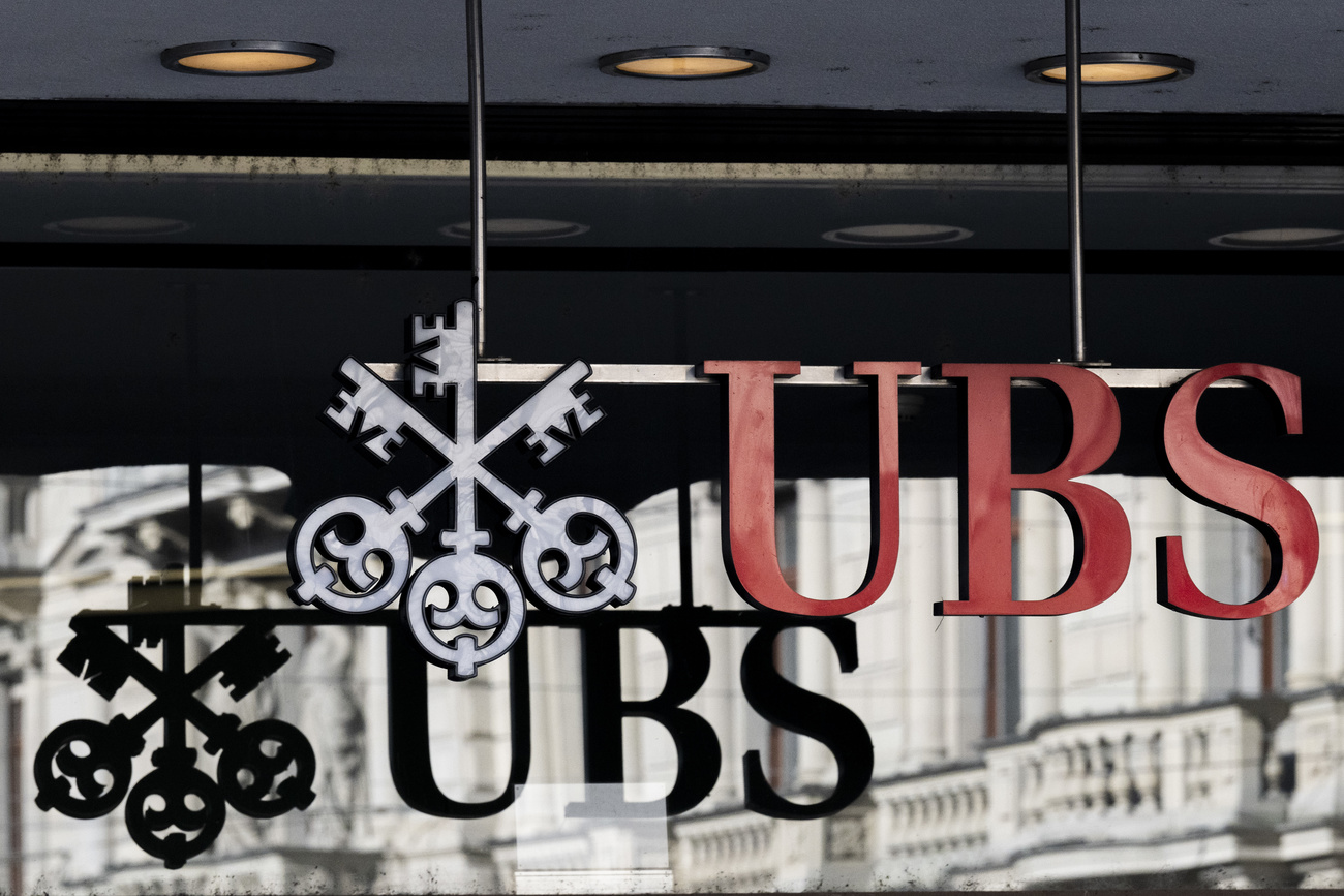 UBS logo in window reflection.