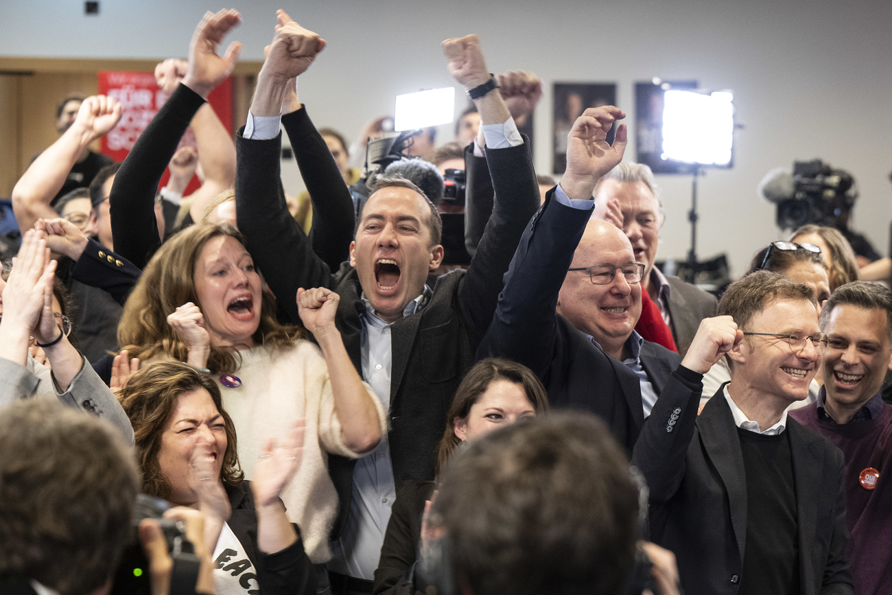 Supporters of the 13th monthly pension payment initiative celebrate on March 3 in Bern.