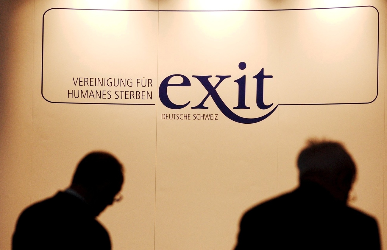 Picture of the blue logo of EXIT Switzerland with two male silhouette