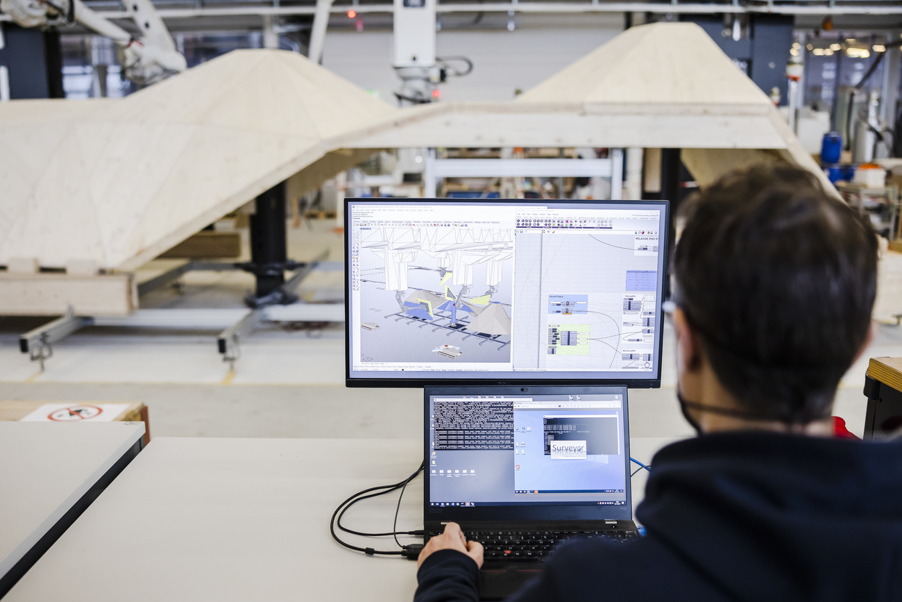 Scientist at computer at federal technology institute ETH Zurich