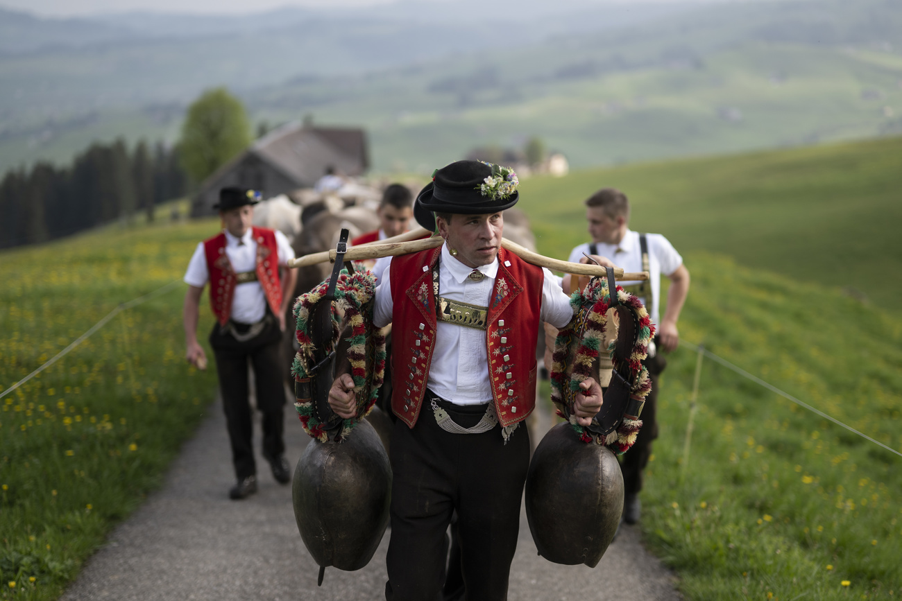 swiss men in traditional attire