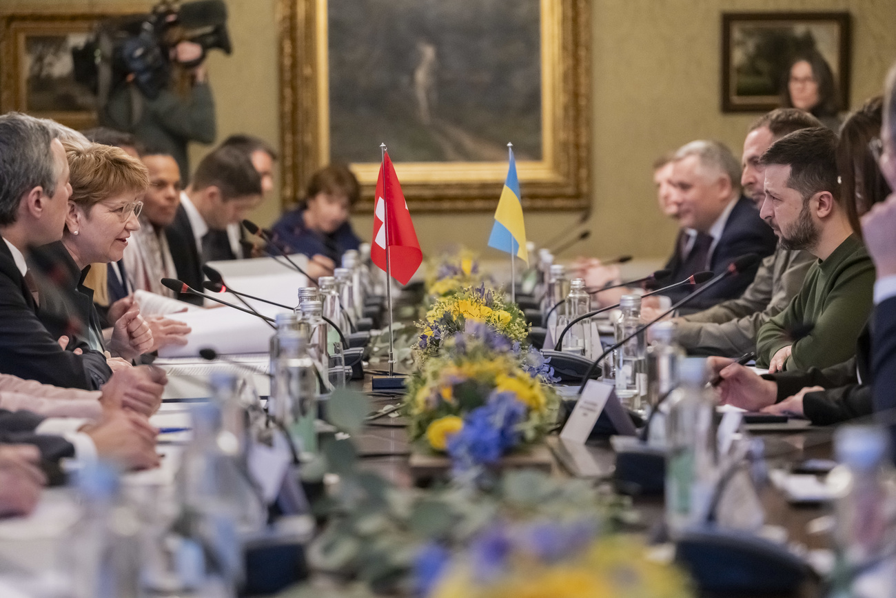 Swiss Federal President Viola Amherd, left, and Volodymyr Zelenskyy, President of Ukraine, right, with their delegations, hold bilateral talks, on Monday, January 15, 2024 in Kehrsatz near Bern, Switzerland. Zelenskyy will attend the World Economic Forum in Davos starting Tuesday. (KEYSTONE/POOL/Alessandro della Valle)