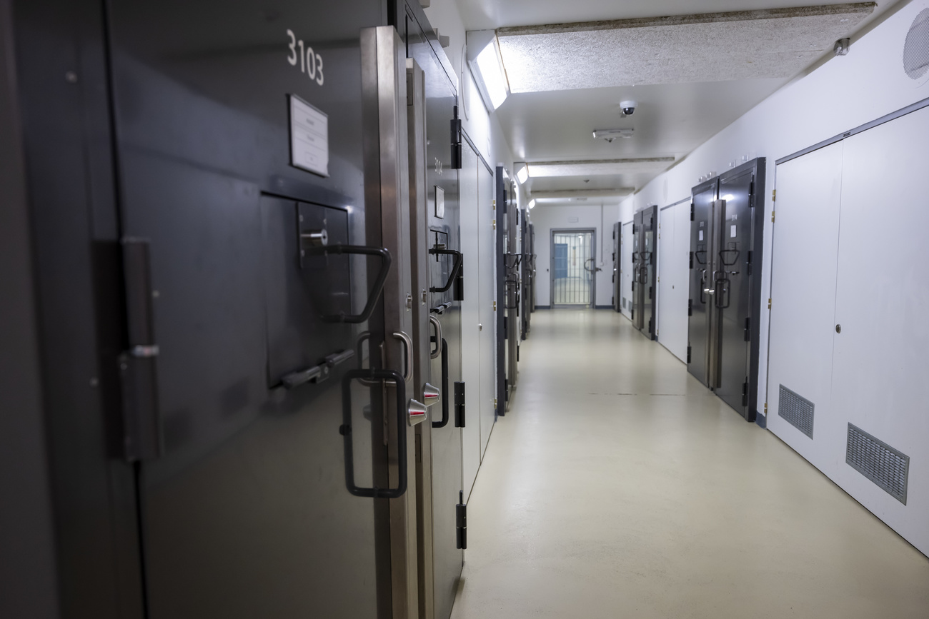 A view of several prison cell doors in a hallway of the prison in Brenanz in canton Geneva