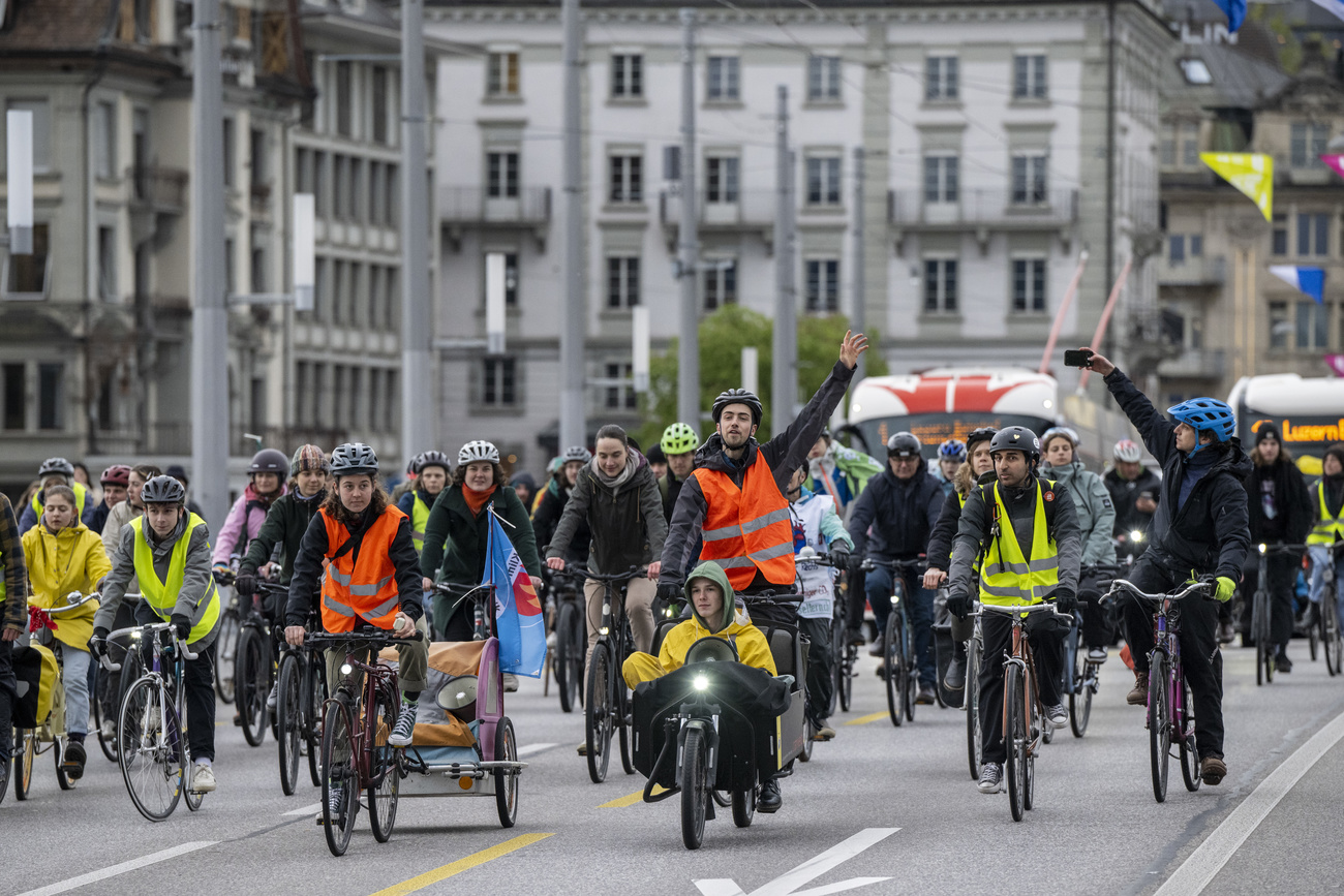 Climate protesters on bicycles in Swiss city of Lucerne, April 19, 2024