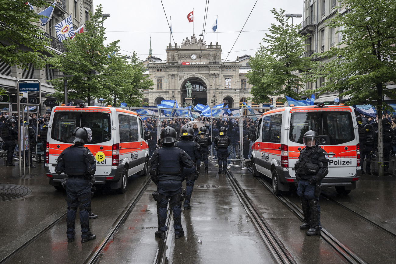 Zurich football fans gather in city centre after part of stadium is closed off