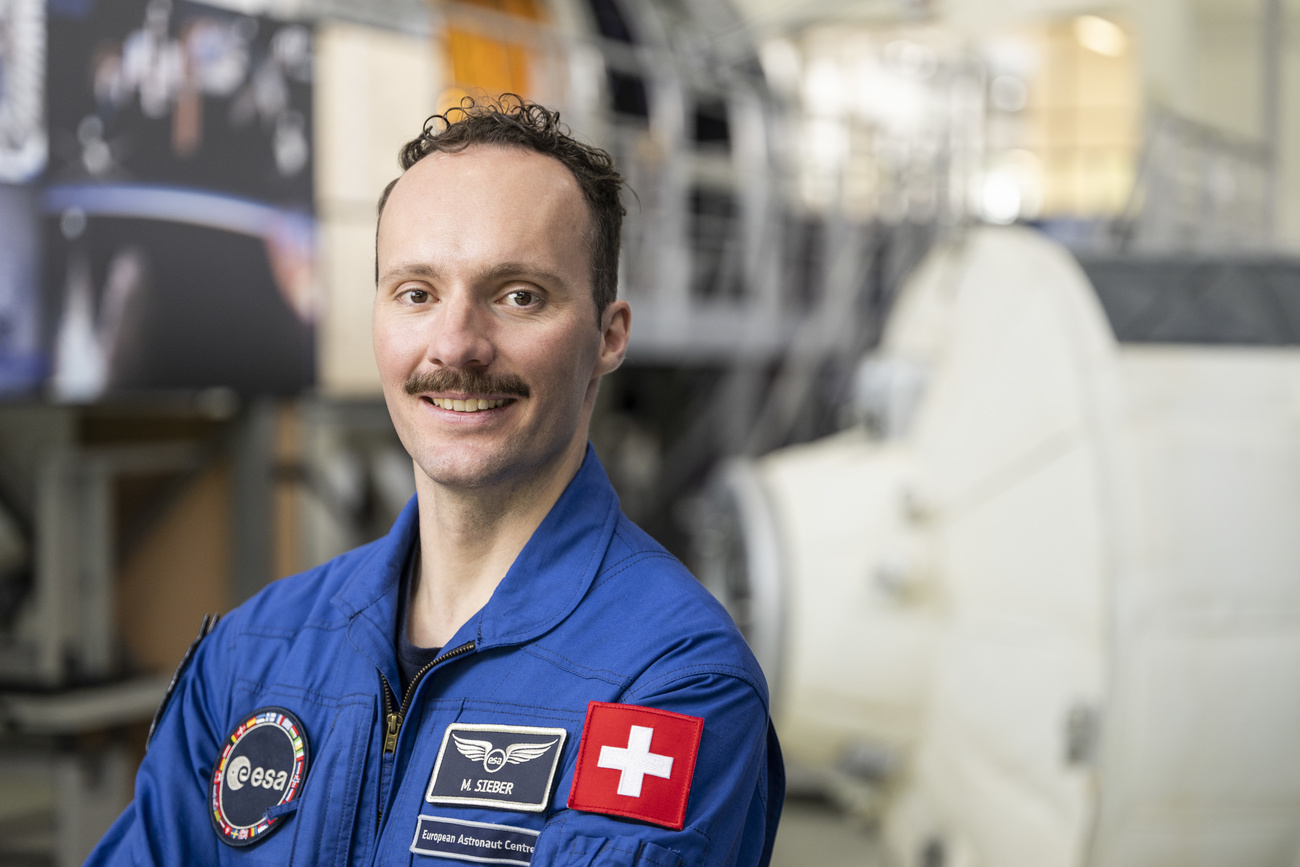 Marco Alain Sieber from Bern, newly certified ESA astronaut, poses in the training hall in Cologne Germany.