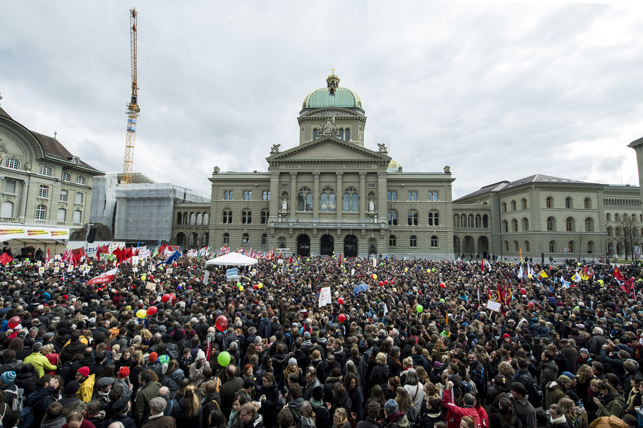 Crowd in from of Federal Palace in Bern, Switzerland