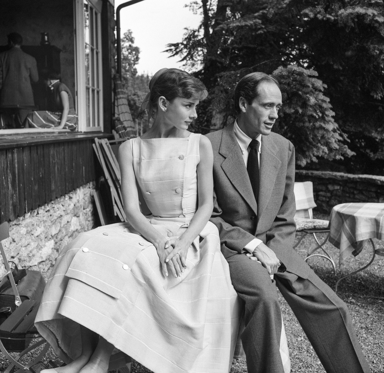 American actor Mel Ferrer and his wife, actress Audrey Hepburn, in front of a chalet on the Bürgenstock, 1959.