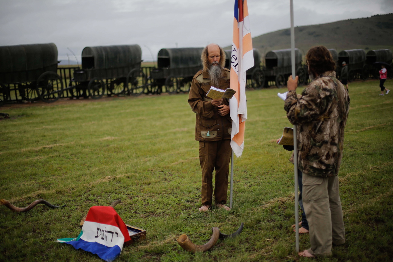 Afrikaaners sing songs in 2014 to commemorate a Boer war battle near Dundee, South Africa.