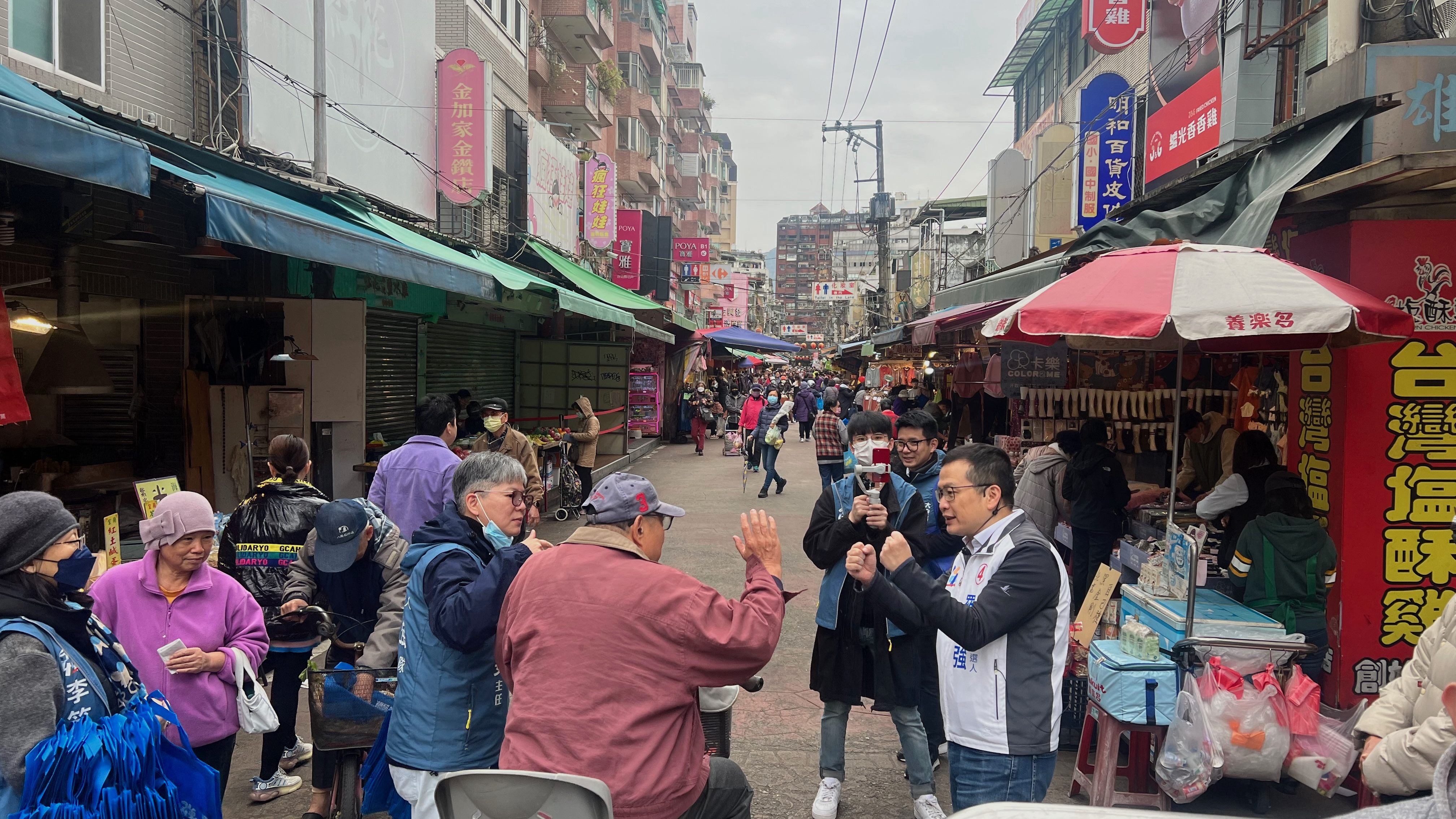Politician Chih-chiang Lo from the conservative KMT campaigning on a market street in the Da'an district of Taipei in early 2024