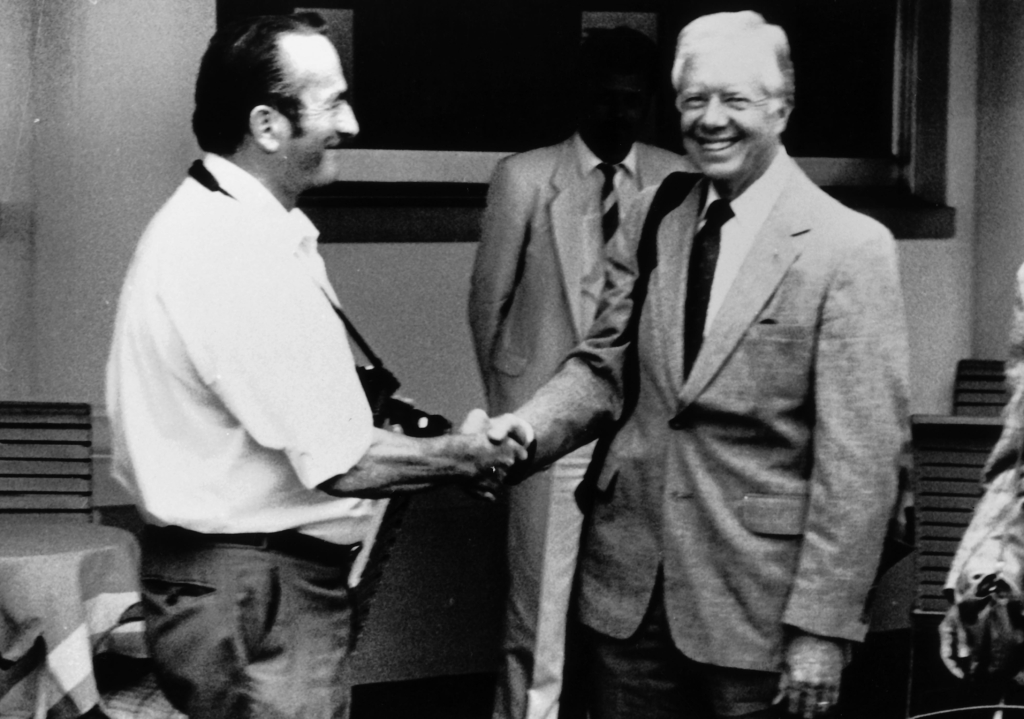 Nidwalden police photographer Karl Odermatt greets the future American President Jimmy Carter, 1960.