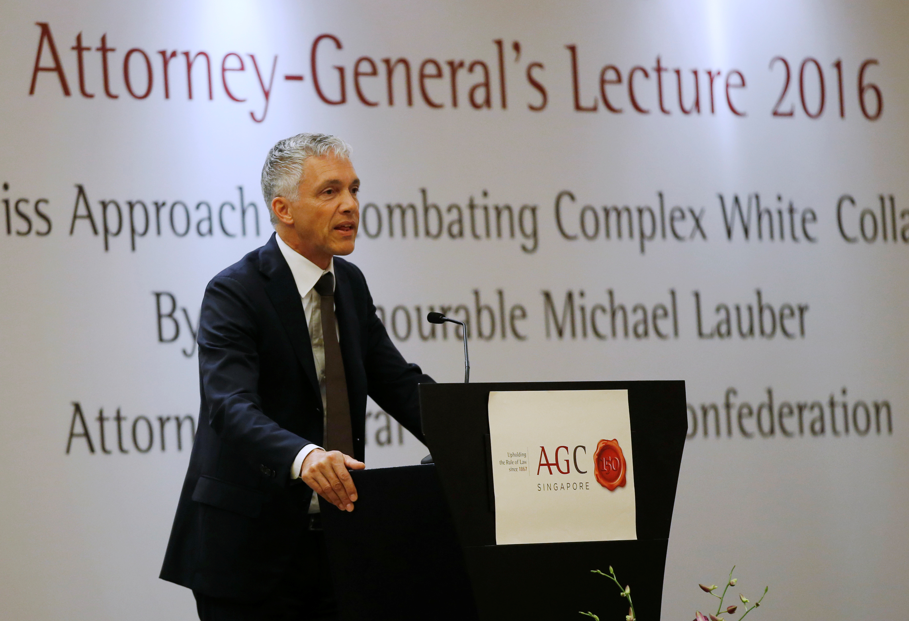 Michael Lauber, middle age man with microphone