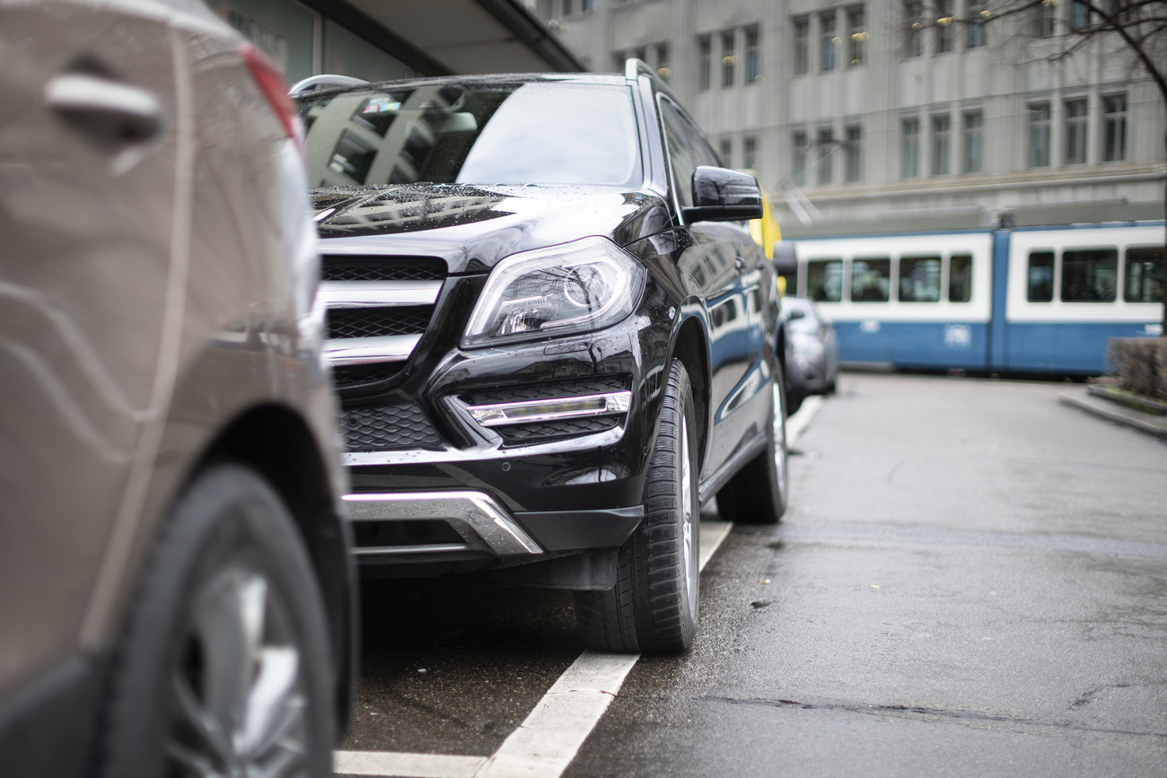 cars parked next to the street