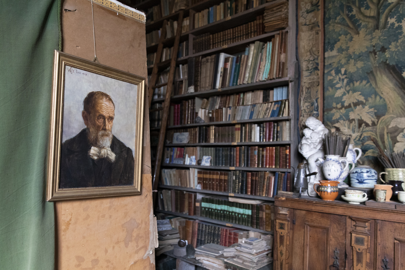 A portrait of the Swiss painter Albert Anker, painted by Wilhelm Steinhausen, hangs in his former studio in the Albert Anker House in Ins.