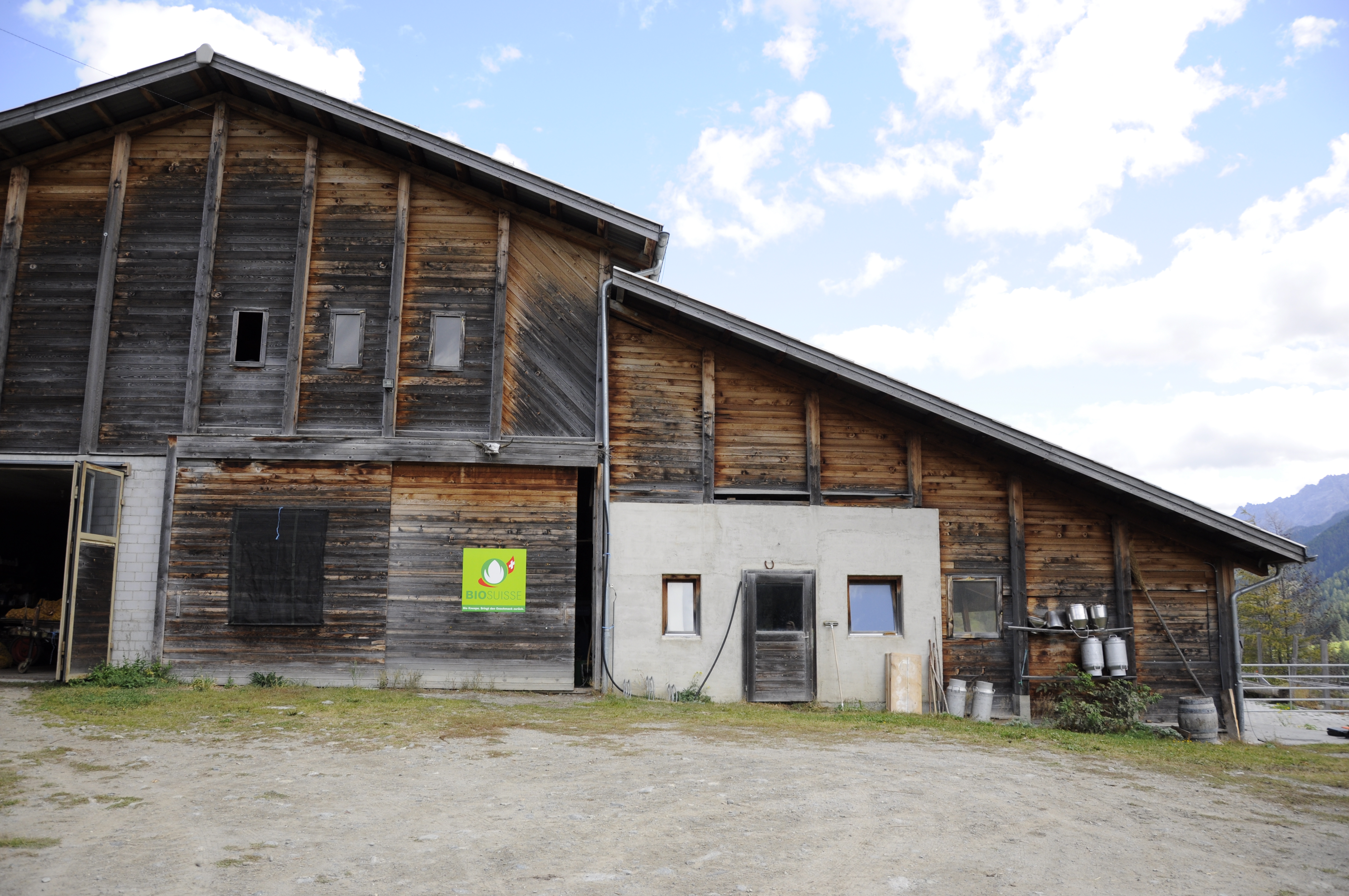 a farm building with the Biosuisse logo