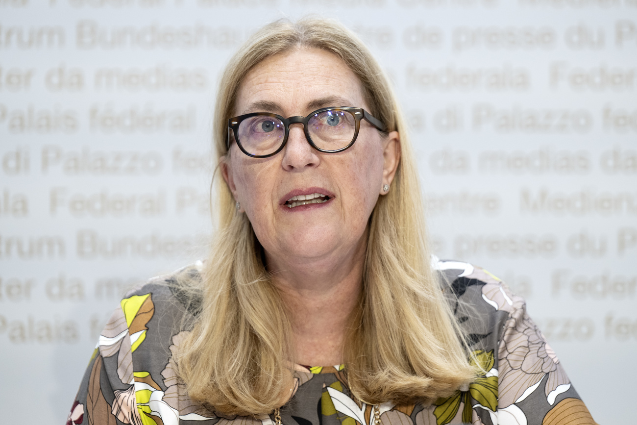 Photo of a woman speaking at a press conference