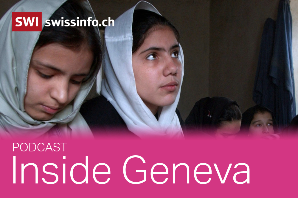 Picuture of young girls in a school in Afghanistan writing on notepads.