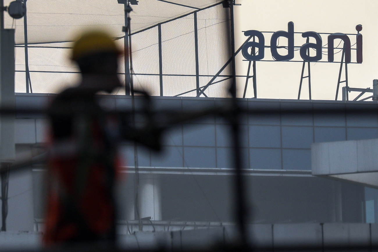 epa10444439 The logo of Adani Group atop a building in Mumbai, India, 02 February 2023. US forensic financial research company Hindenburg Research on 24 January published a report accusing Indian conglomerate Adani Group of stock market manipulation andd fraud, which the Adani Group denies. EPA/DIVYAKANT SOLANKI