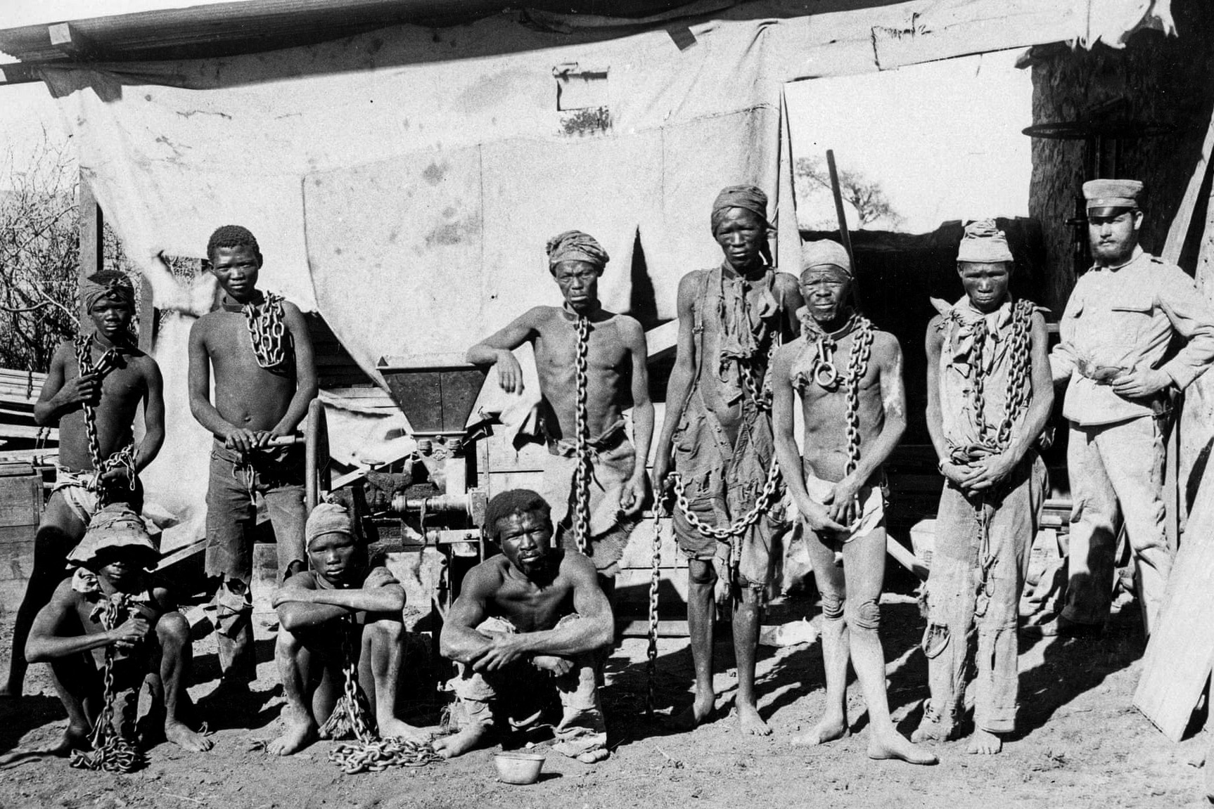 A group of Herero and Nama prisoners held by German soldiers. The troops of the German Empire killed up to 100,000 people between 1904 and 1908.