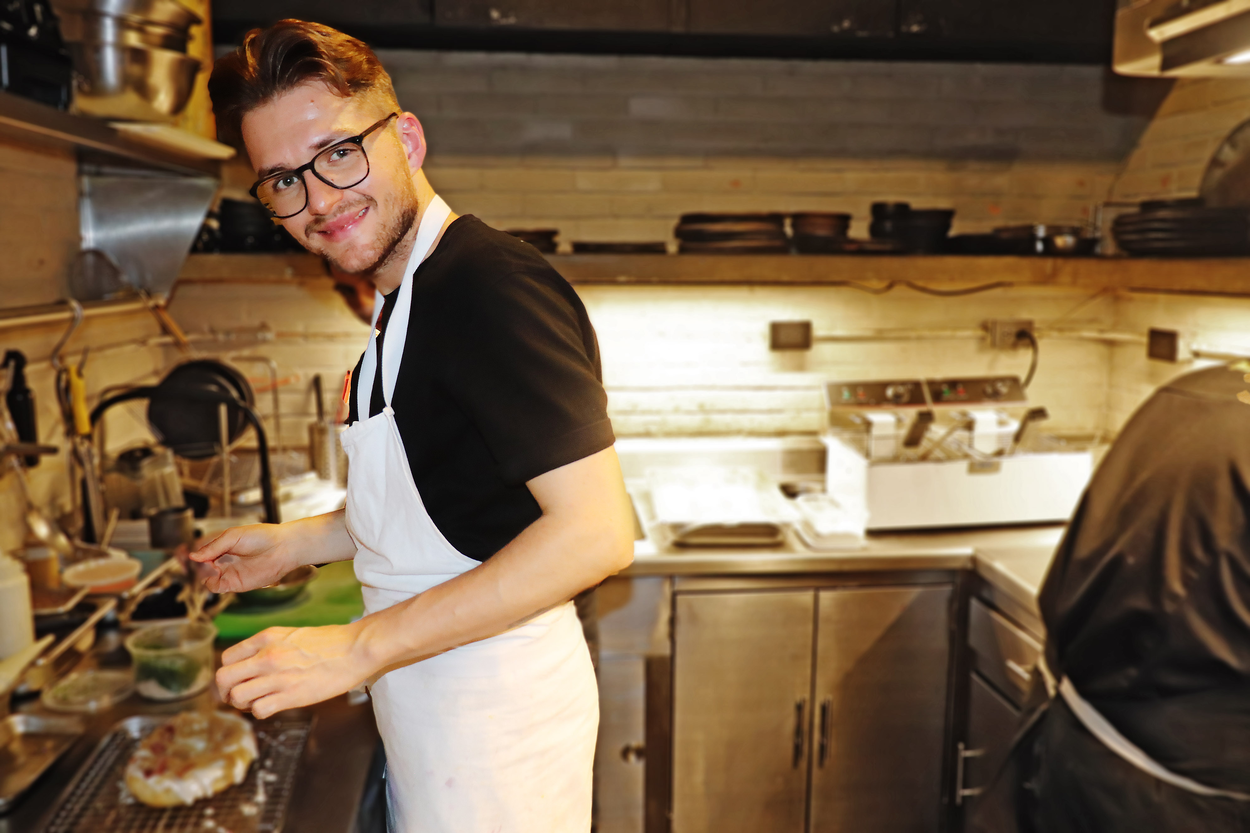 Luc Liebster in the cramped kitchen of the Canopia.