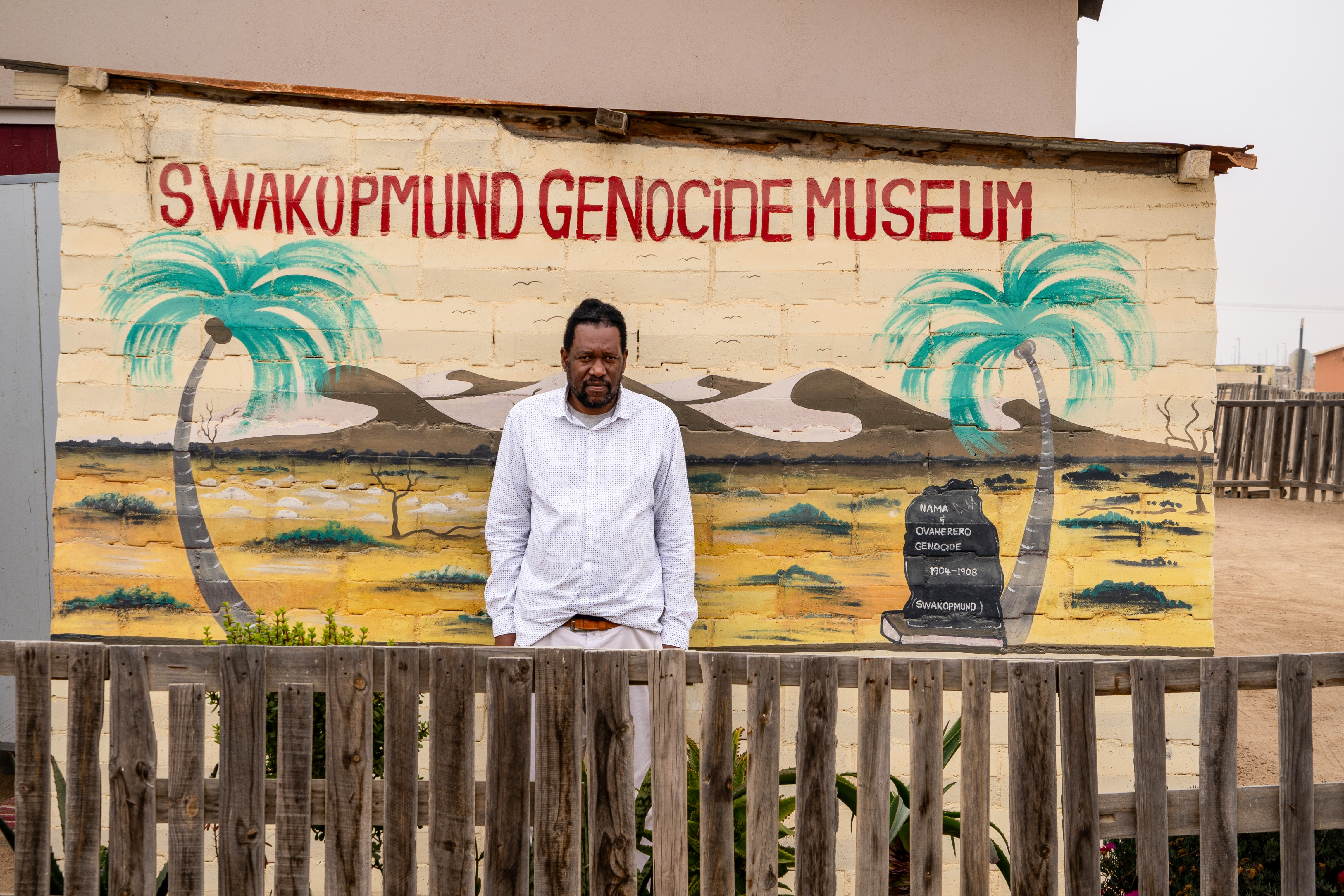 Laidlaw Peringanda stands in front of his genocide museum in a suburb on the outskirts of Swakopmund.