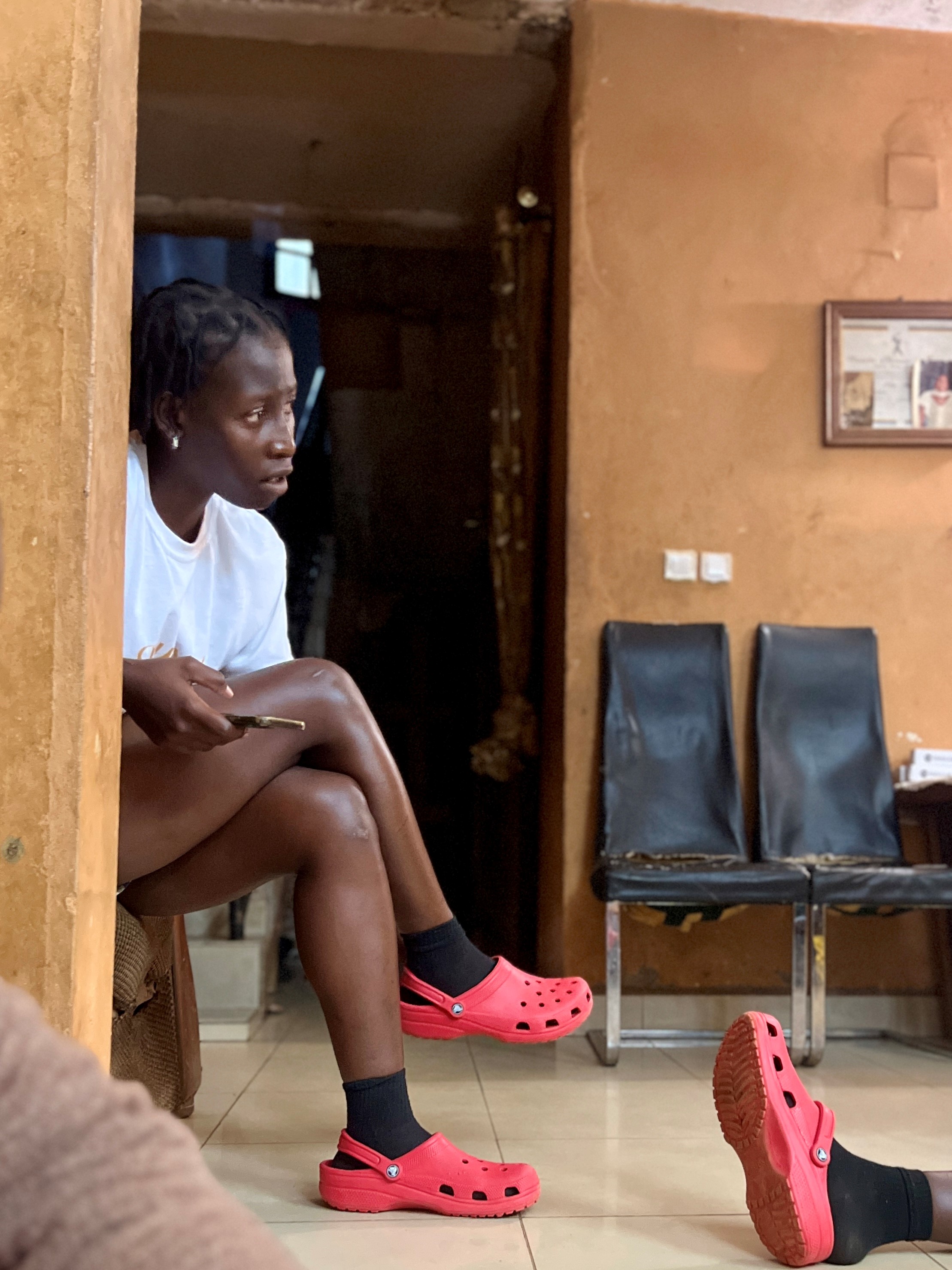 Rose Michelle Priso Guidjam talks to her twin sister.