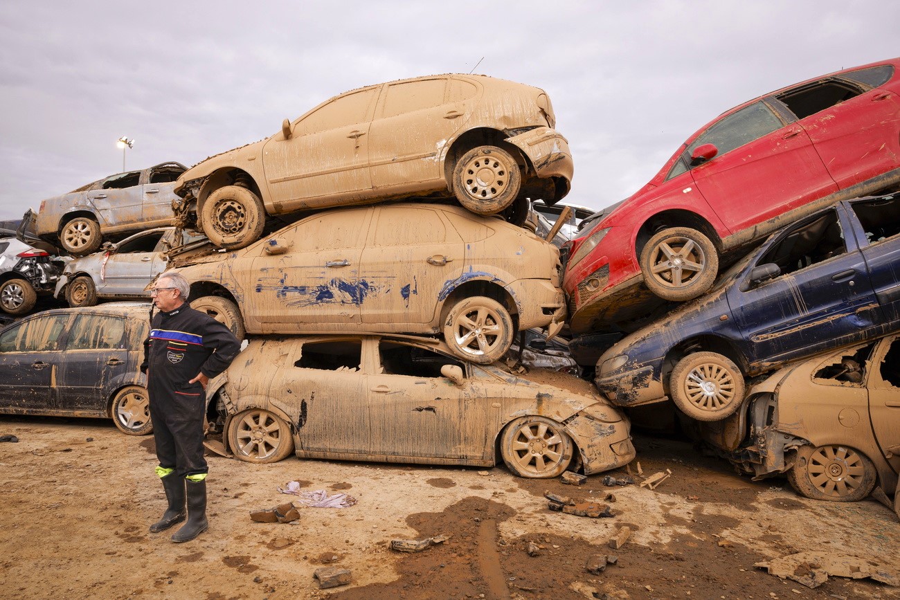 Vehicles destroyed by devastating flash floods that struck Benetusser in Valencia, eastern Spain, on November 23, 2024.