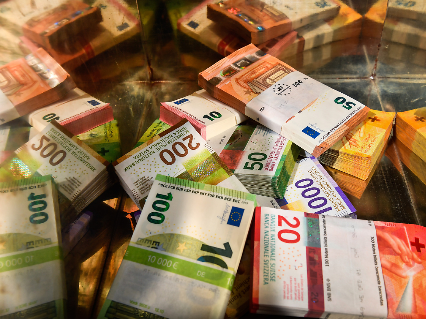 Two men charged by the MPC with money laundering