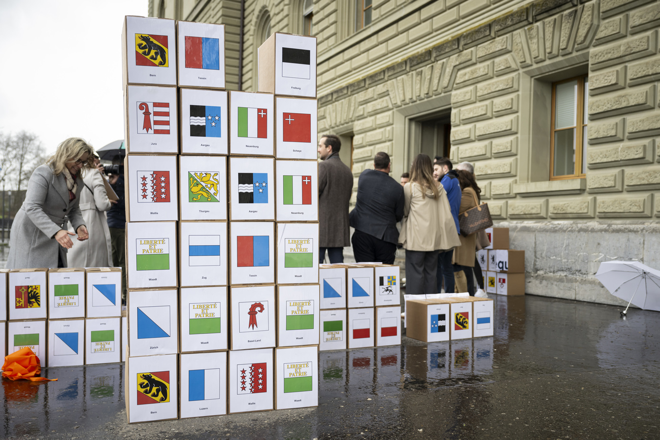 The boxes with the collected signatures, photographed at the handover for the popular initiatives "Yes to fair AHV pensions also for married couples" and "Yes to fair federal taxes also for married couples",