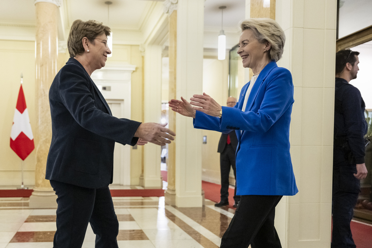 Swiss Federal President Viola Amherd, left, welcomes European Commission President Ursula von der Leyen, right, before a bilateral meeting on Friday, December 20, 2024 in Bern,