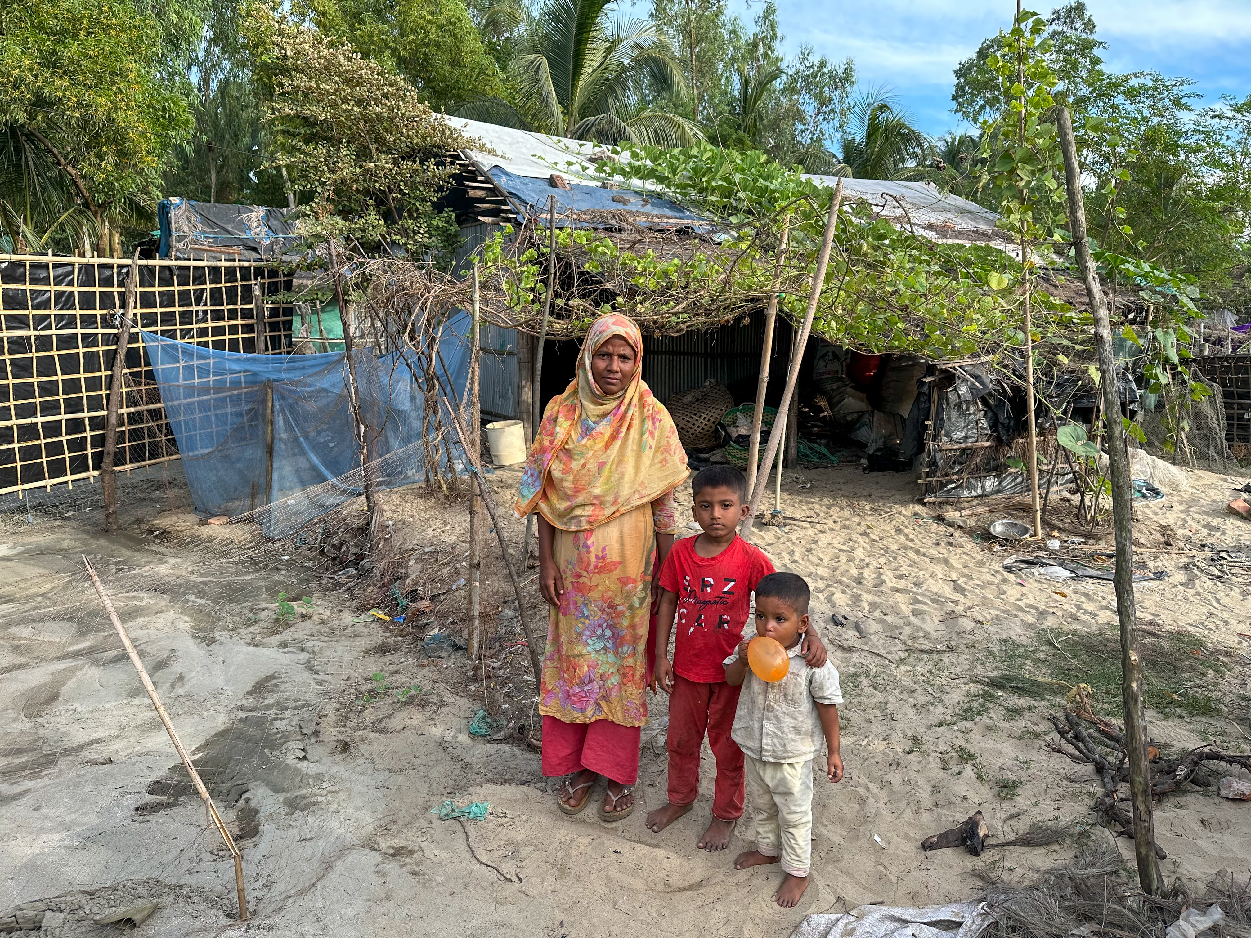 Jannatul Firdas and two of her four children.