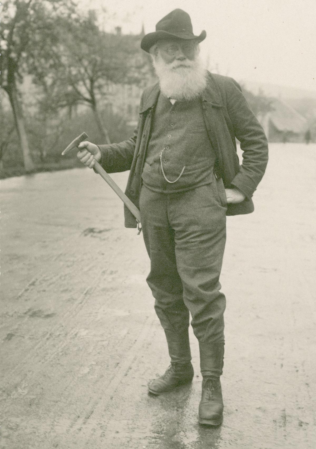 black-and-white photo of a man with a big beard