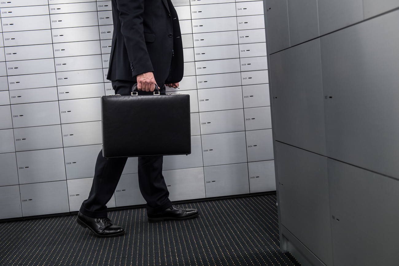 man carrying briefcase