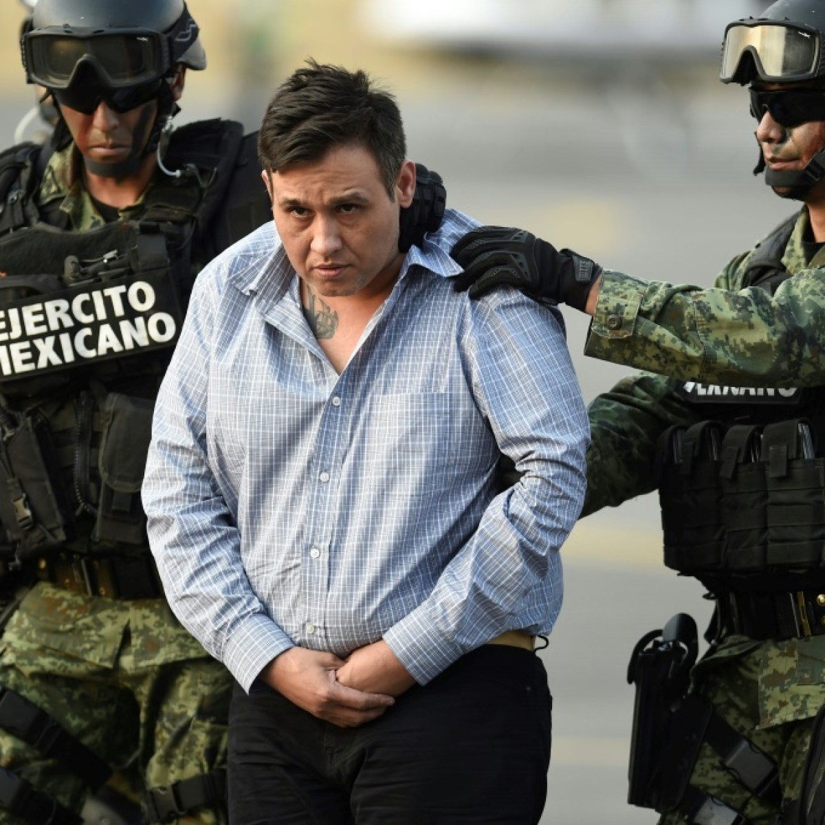 México extradita a EEUU a 29 presuntos narcotraficantes en medio de presiones de Trump - SWI swissinfo.ch