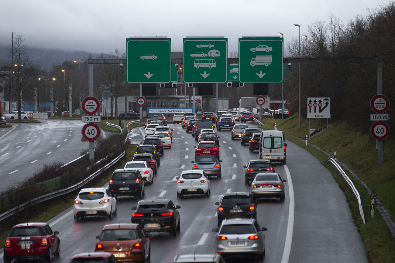 Photo of cars queuing for cross-border controls near Geneva.