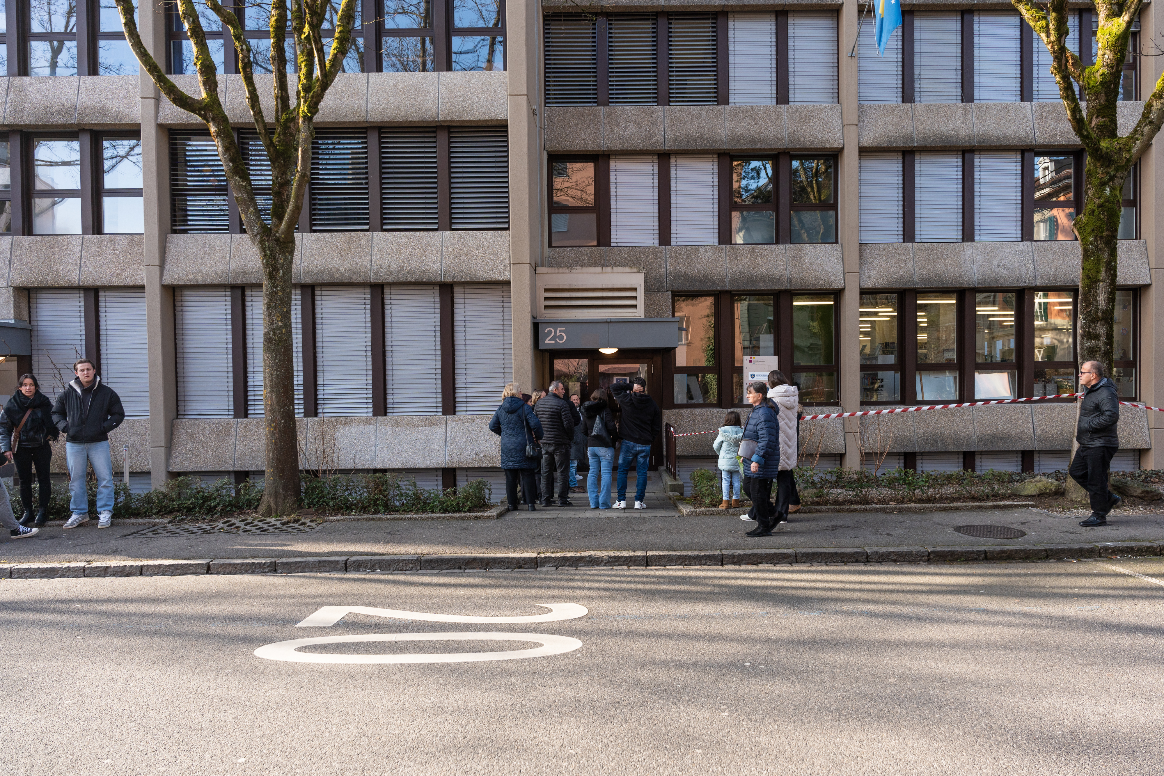 People waiting in line outside
