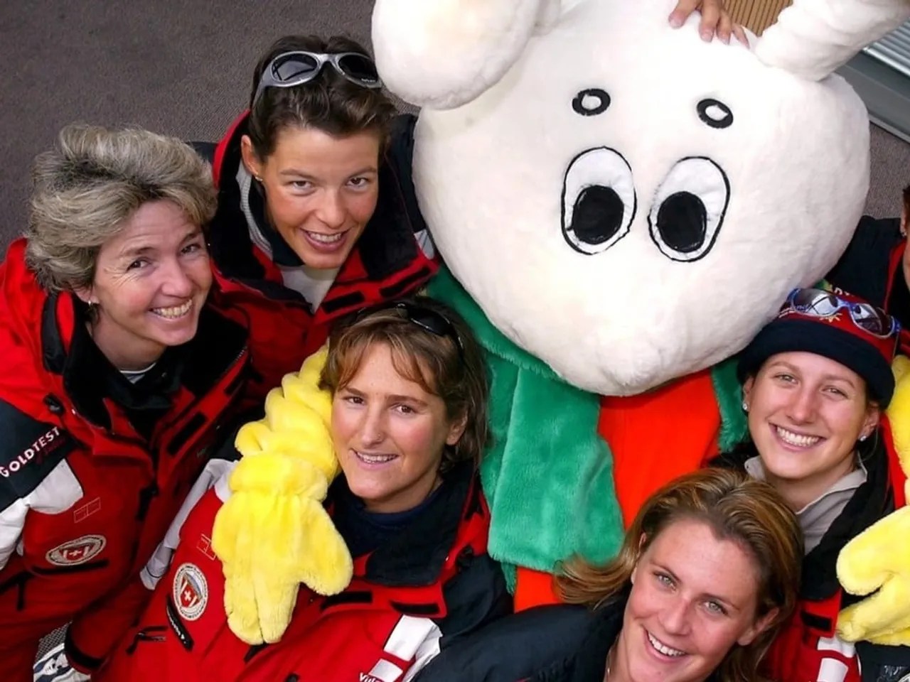 Teachers from the Swiss Ski School pose with Snowli in the Vaud holiday resort of Villars.