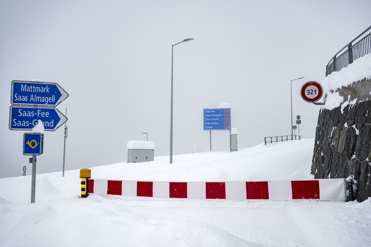 A barrier closed the snow-covered road to Saas-Fee to all vehicles on Good Friday.