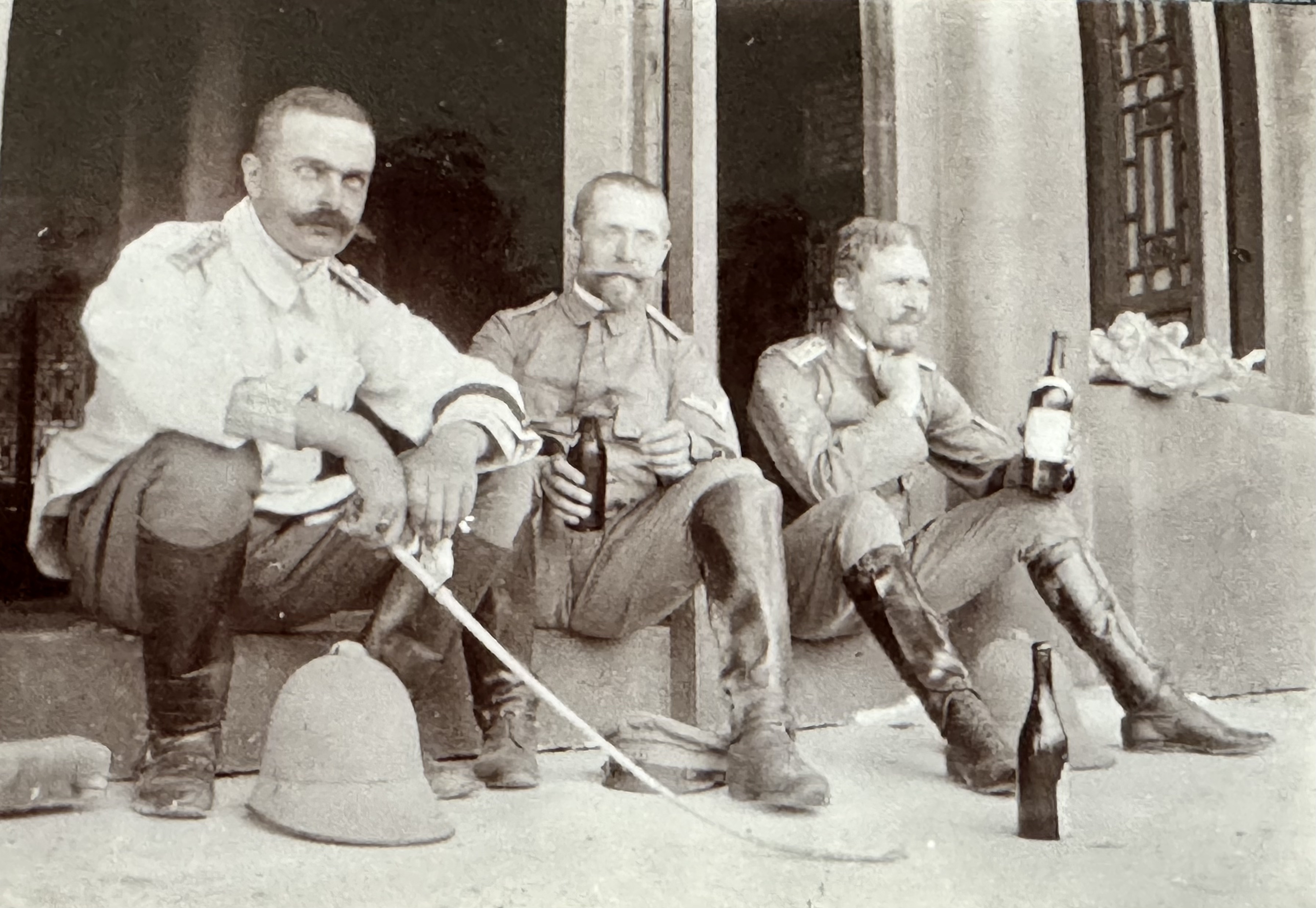 Resting at the summer palace in the forbidden city of Beijing. Max Huber on the left.